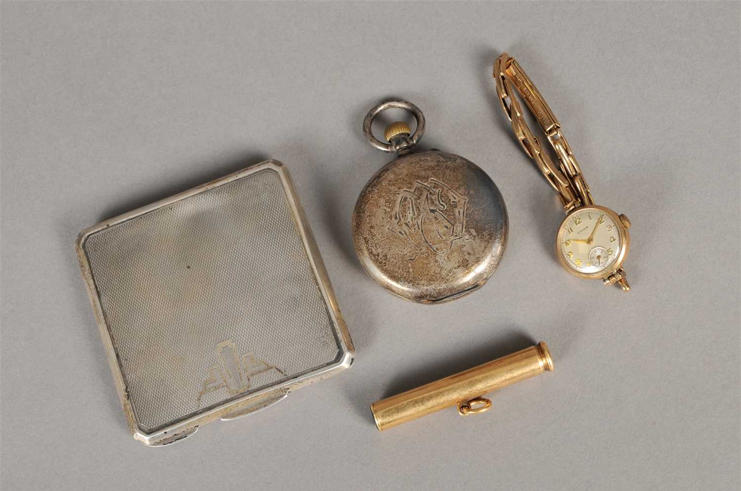 Lot 73 - An Art Deco silver compact, a 9ct gold wristwatch, a pencil and a pocket watch