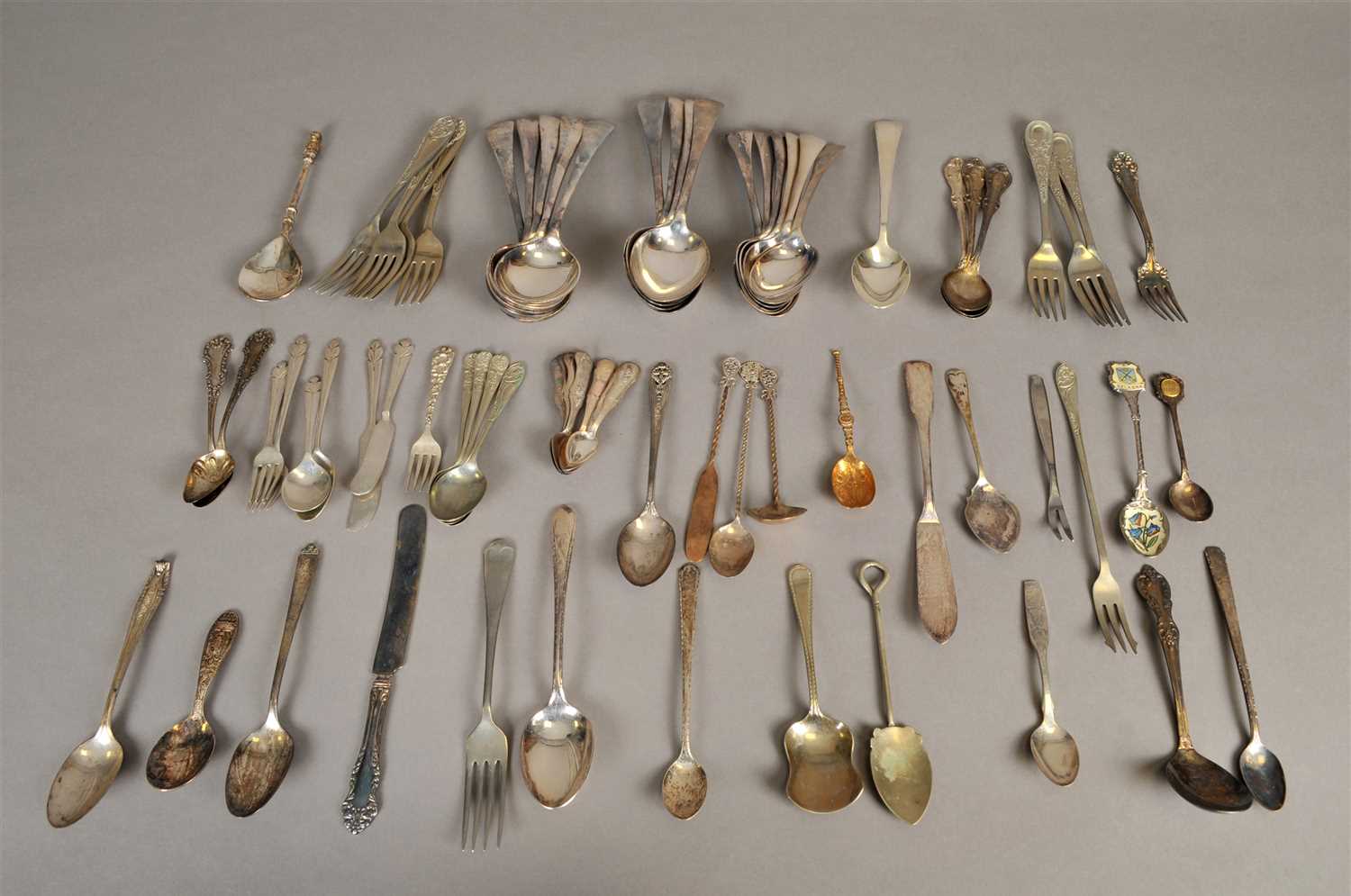 Lot 78 - A collection of plated wares and white metal flatware