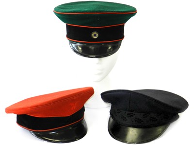 Lot 724 - Three German visor caps