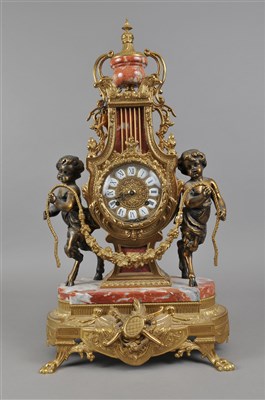 Lot 320 - A gilt metal and marble framed Regency style mantle clock