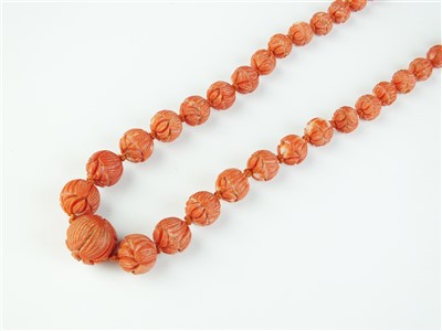 Lot 121 - A carved coral necklace