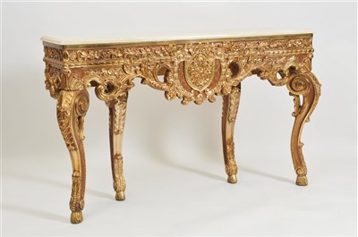 Lot 361 - A decorative reproduction composite stone topped gilded pier / side table