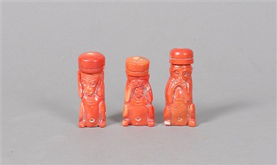 Lot 3 - A trio of Chinese carved coral flasks in the form of monkeys