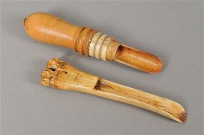 Lot 201 - Two 19th century or earlier bone apple corers