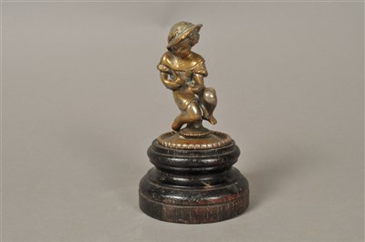 Lot 198 - An Edwardian cast metal figural mascot, in the...