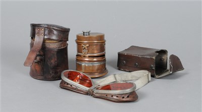 Lot 242 - A small Edwardian copper travelling spirit stove and Edwardian driving goggles