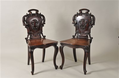 Lot 356 - A pair Victorian oak hall chairs