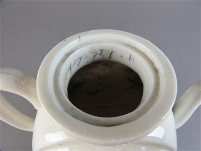 Lot 21 - A Chinese porcelain teapot, Dehua, Qing...