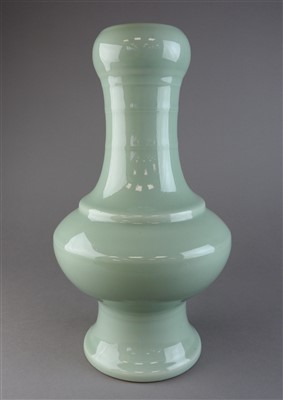 Lot 4 - A Chinese celadon porcelain garlic mouth vase,...