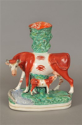 Lot 164 - Staffordshire cow and calf group spill vase