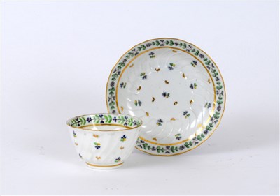 Lot 37 - Caughley tea bowl and saucer in 'French Sprigs'