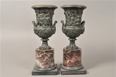 Lot 235 - A pair of 19th century Bacchanalian bronze pedestal urns on marble plinth bases