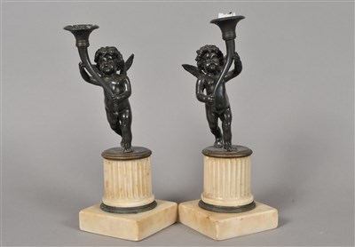 Lot 213 - A pair of 19th century bronze candle sticks