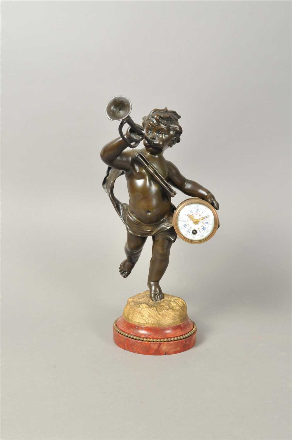 Lot 226 - After Rousseau, a 19th century French figural bronze table clock