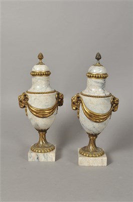 Lot 228 - A decorative pair of late 19th century polished granite and ormolu mounted Bacchanalian urns