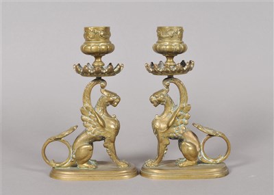 Lot 475 - A decorative pair of 19th century cast brass chamber sticks