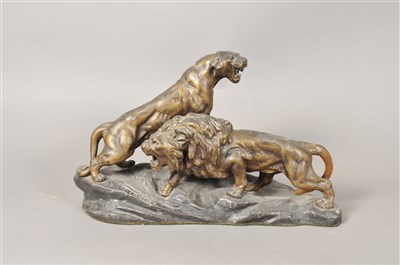 Lot 225 - After Thomas Francois Cartier, a hollow cast group of a snarling lion and lioness