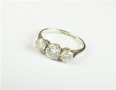 Lot 127 - A graduated three stone diamond ring