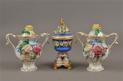 Lot 163 - Three porcelain pot pourri jars and covers