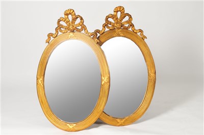 Lot 377 - A decorative pair of Regency style gilt framed wall mirrors