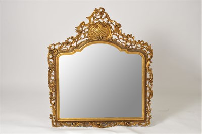 Lot 378 - A decorative gilt framed over-mantle wall mirror