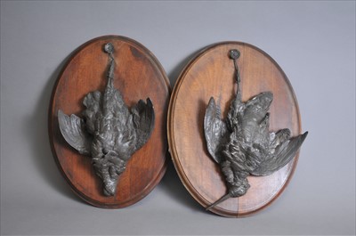 Lot 645 - A pair of 19th century cast bronze studies of hanging dead game