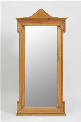 Lot 393 - A small Victorian stripped pine wash stand and a pine framed wall mirror