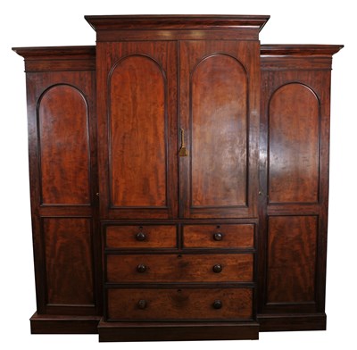 Lot 396 - A large 19th century mahogany linen-press wardrobe