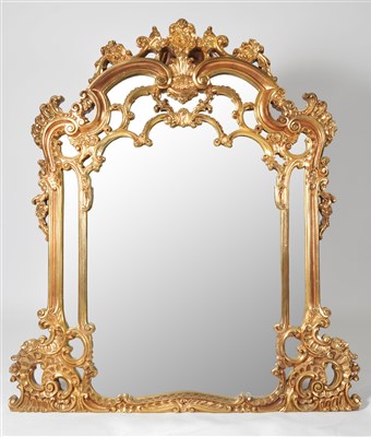 Lot 399 - A large decorative gilt framed wall mirror