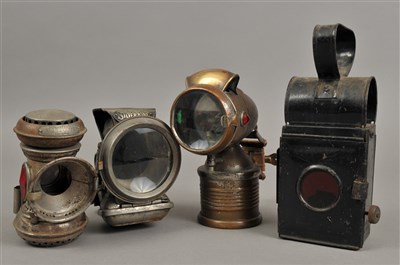 Lot 264 - A collection of early 20th century bicycle lamps