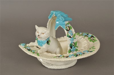 Lot 186 - Victorian porcelain kitten in basket