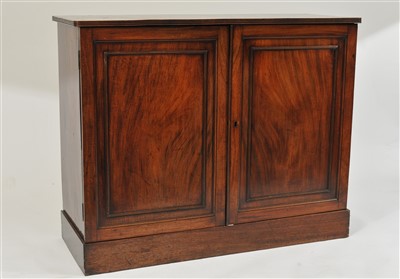 Lot 129 - An early 19th century mahogany hall cupboard