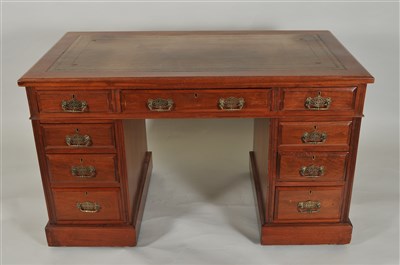 Lot 390 - An early 20th century mahogany pedestal desk and a Hillcrest office / desk chair