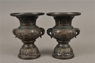 Lot 221 - A pair of Chinese bronze twin-handled spill vases