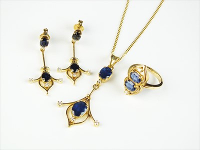 Lot 119 - An 18ct gold suite of sapphire and diamond jewellery