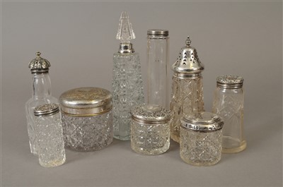 Lot 13 - A collection of silver mounted jars/bottles