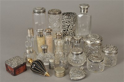 Lot 2 - A collection of silver and white metal mounted bottles and jars