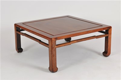 Lot 149 - A Chinese carved hardwood low centre table