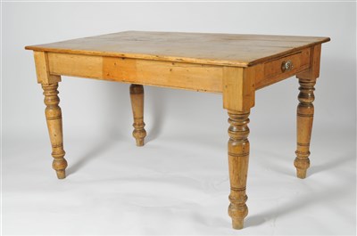 Lot 400 - A rustic 19th century country pine farmhouse kitchen table