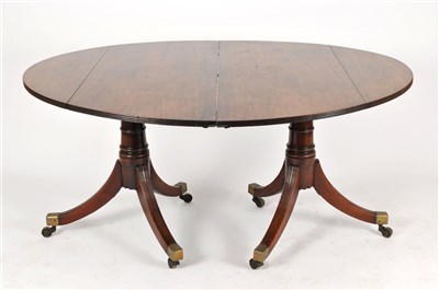 Lot 142 - A large 19th century mahogany twin pedestal dining table