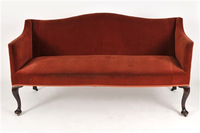 Lot 141 - A low Edwardian upholstered wing-back sofa