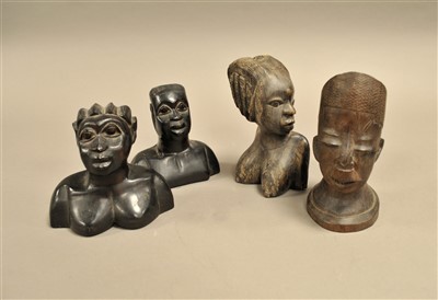 Lot 332 - Two pairs of African carved hardwood export figural bust groups.