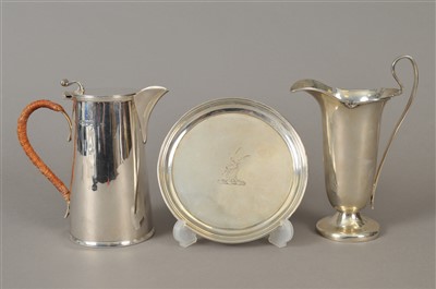 Lot 19 - A silver teapot stand, a silver jug and a silver lidded jug