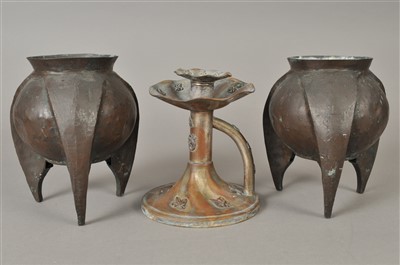 Lot 390 - A pair of arts and crafts copper vases and a chamber stick