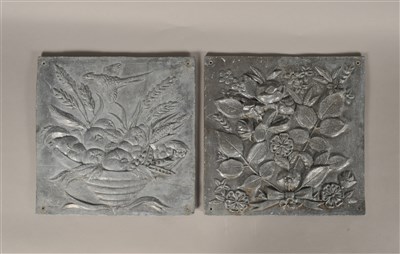 Lot 275 - A decorative pair of moulded lead panels of square form