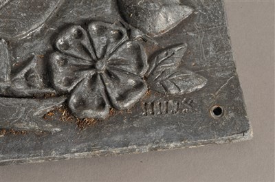 Lot 275 - A decorative pair of moulded lead panels of square form
