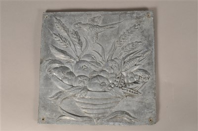 Lot 275 - A decorative pair of moulded lead panels of square form