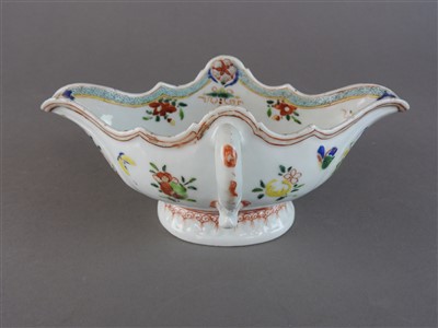 Lot 100 - A Chinese porcelain famille rose twin handled...