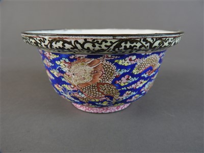 Lot 110 - A Canton enamel dragon bowl, Qing Dynasty,...