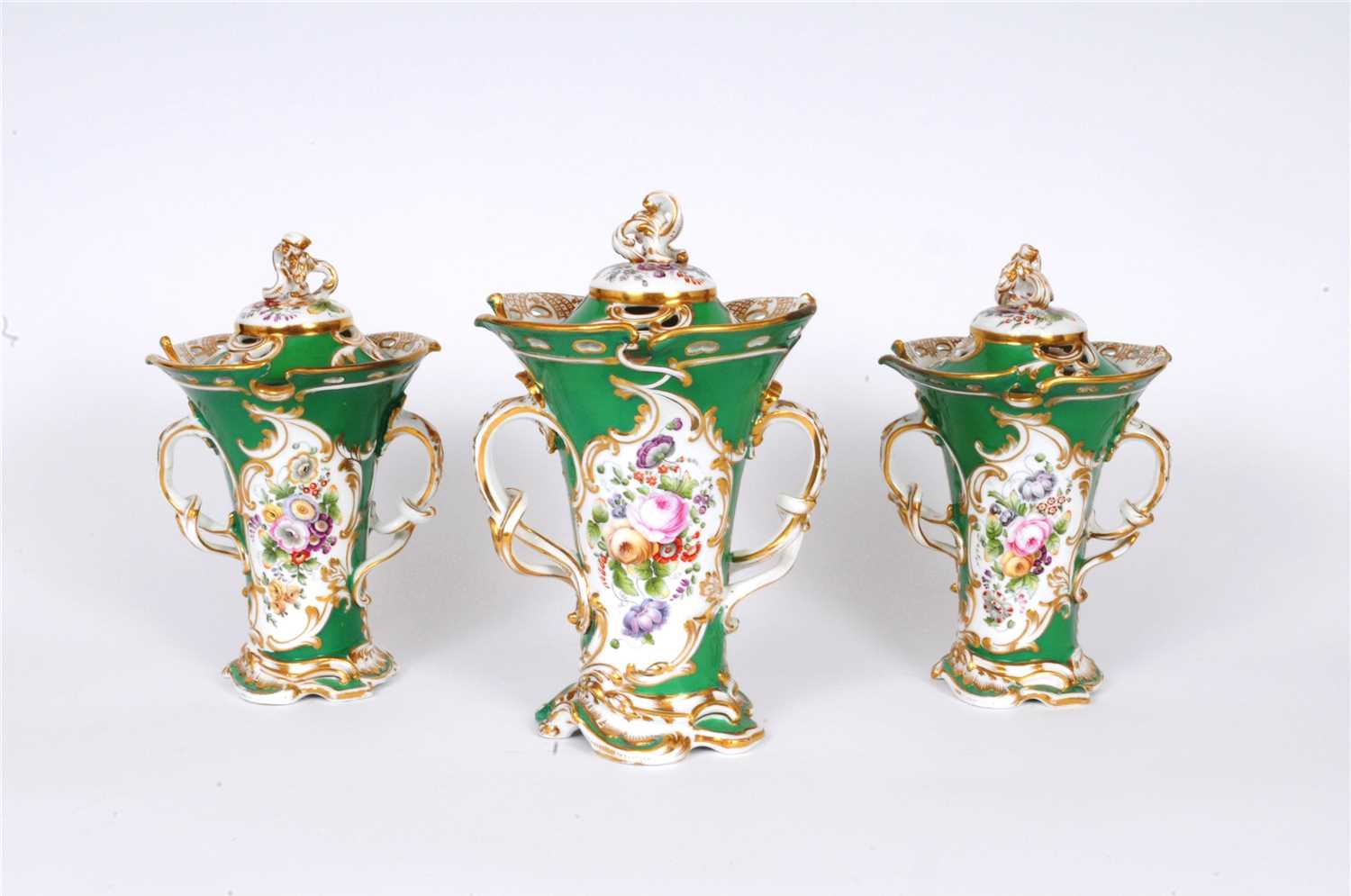 Lot 10 - A garniture of Coalbrookdale-style porcelain vases